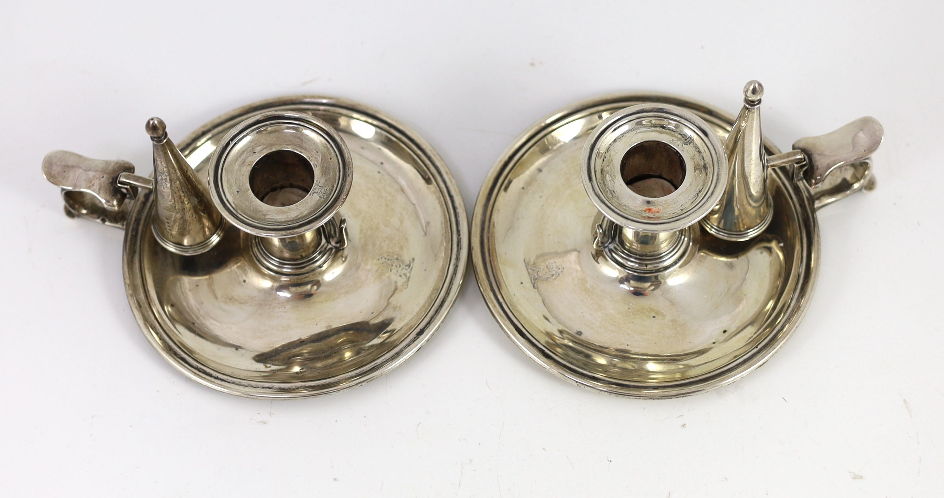 A pair of early Victorian silver circular chambersticks, by R & S Garrard & Co